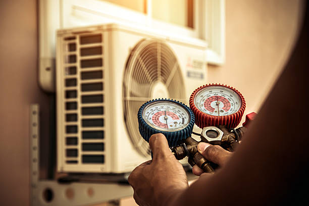 Professional Heat Pump Repair technician working in Edgerton, MO